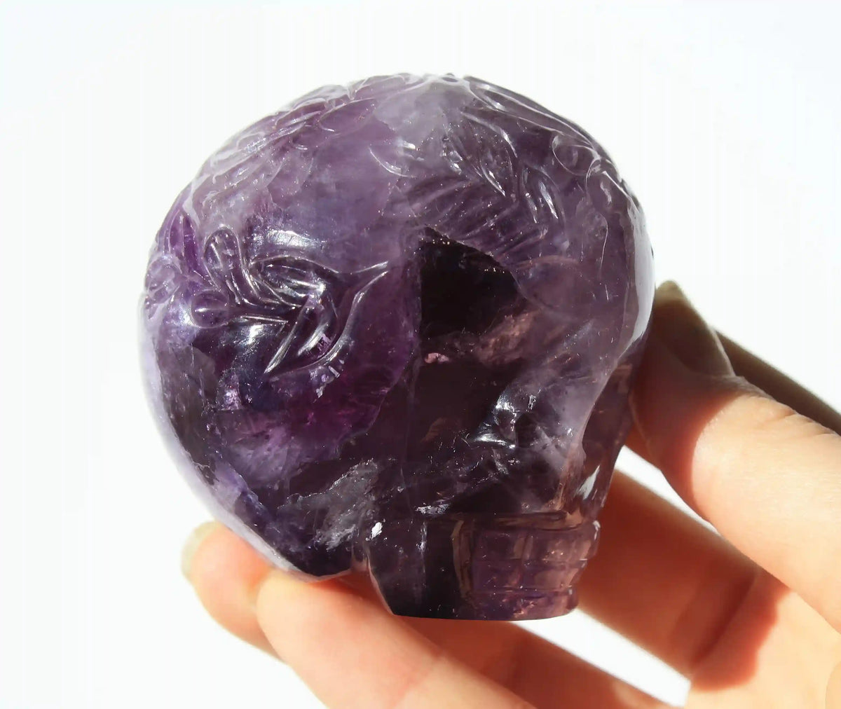 Amethyst Crystal Butterfly Engraved Skull by Vikas Meena