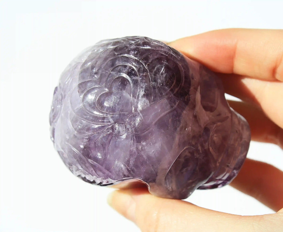 Amethyst Crystal Butterfly Engraved Skull by Vikas Meena
