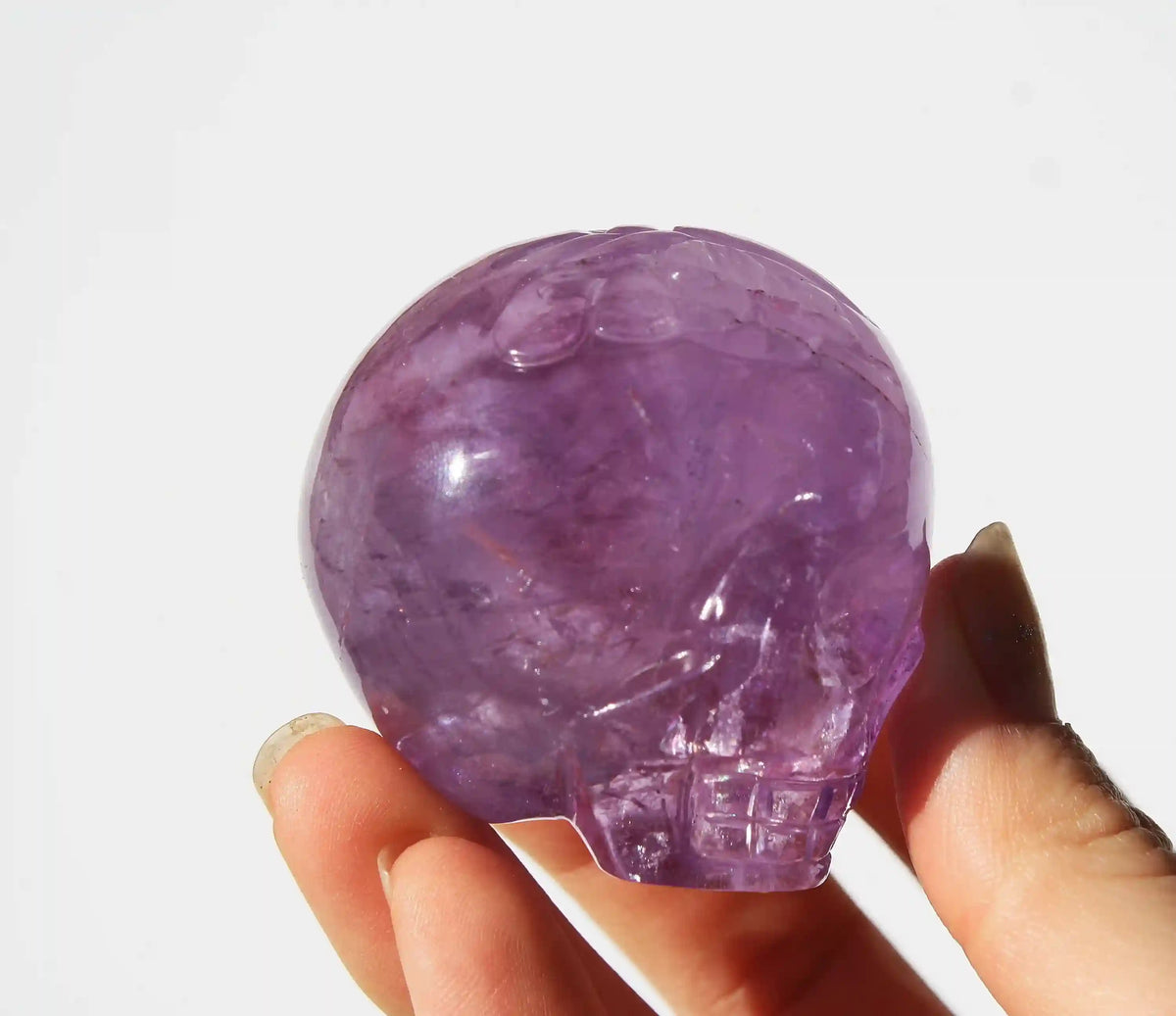 Amethyst Crystal Butterfly Engraved Skull by Vikas Meena