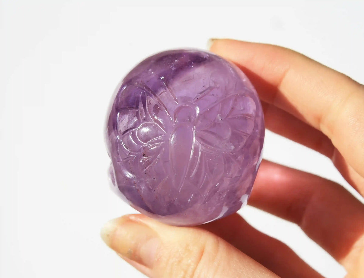 Amethyst Crystal Butterfly Engraved Skull by Vikas Meena