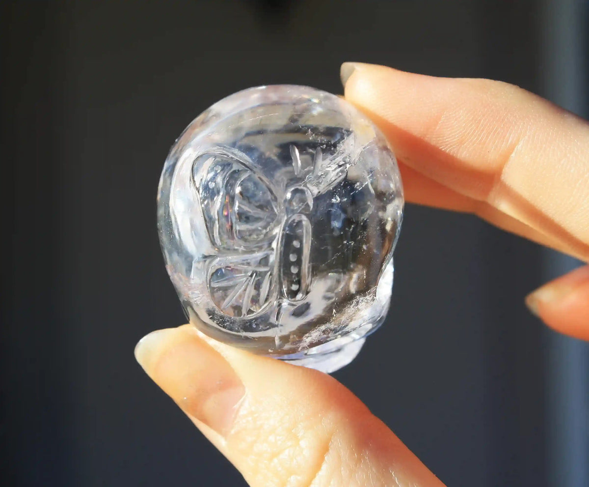 Himalayan Quartz Crystal Butterfly Engraved Skull by Vikas Meena