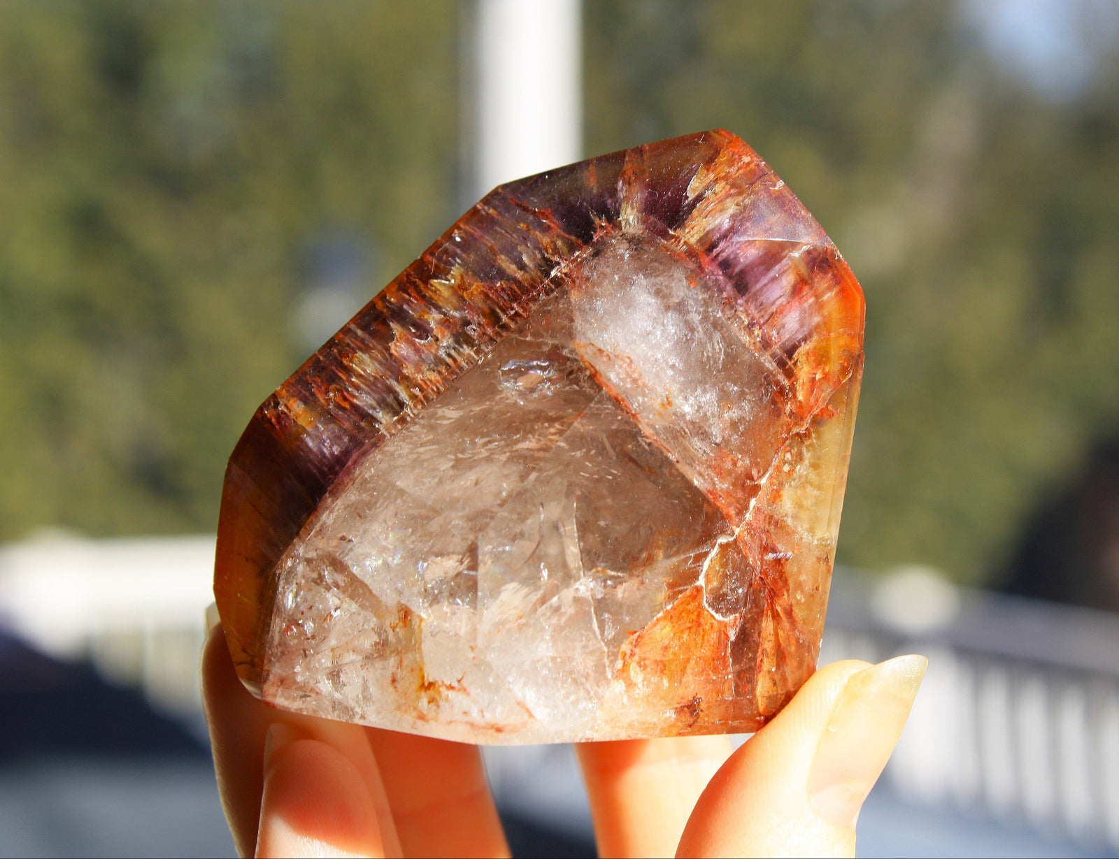 Red Dreamcoat Lemurian seed quartz tower with Super 7 inclusions and a Lemurian quartz core.